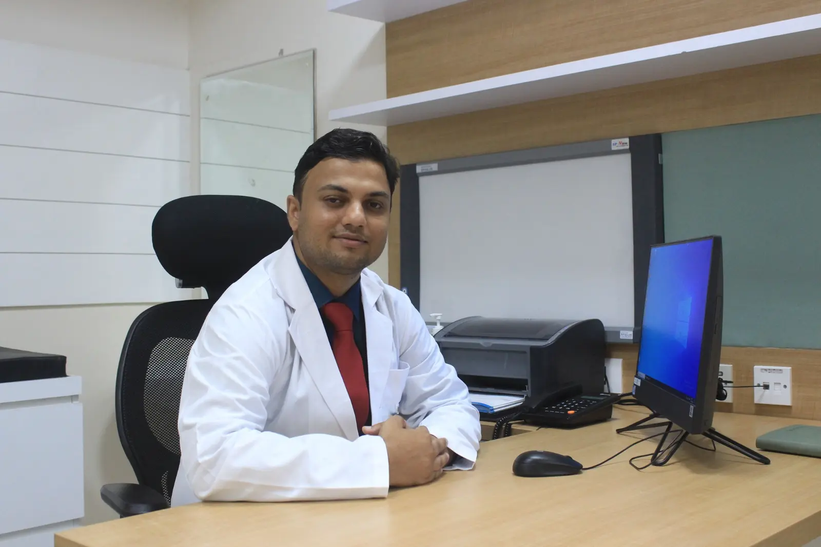 Dr. Himanshu Sharma at the clinic in Delhi and Ghaziabad